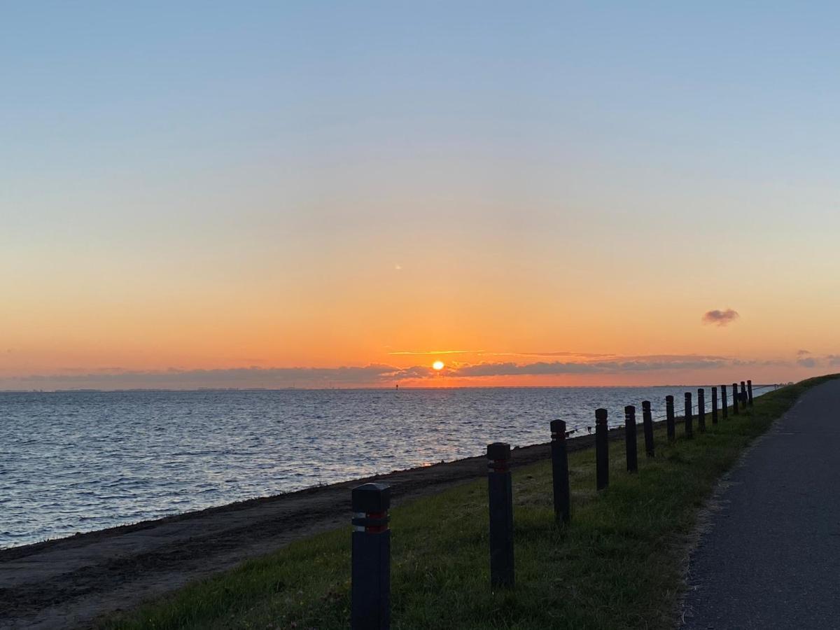 Bungalow Scheldezicht in Zeeland dicht bij zee Scherpenisse Buitenkant foto
