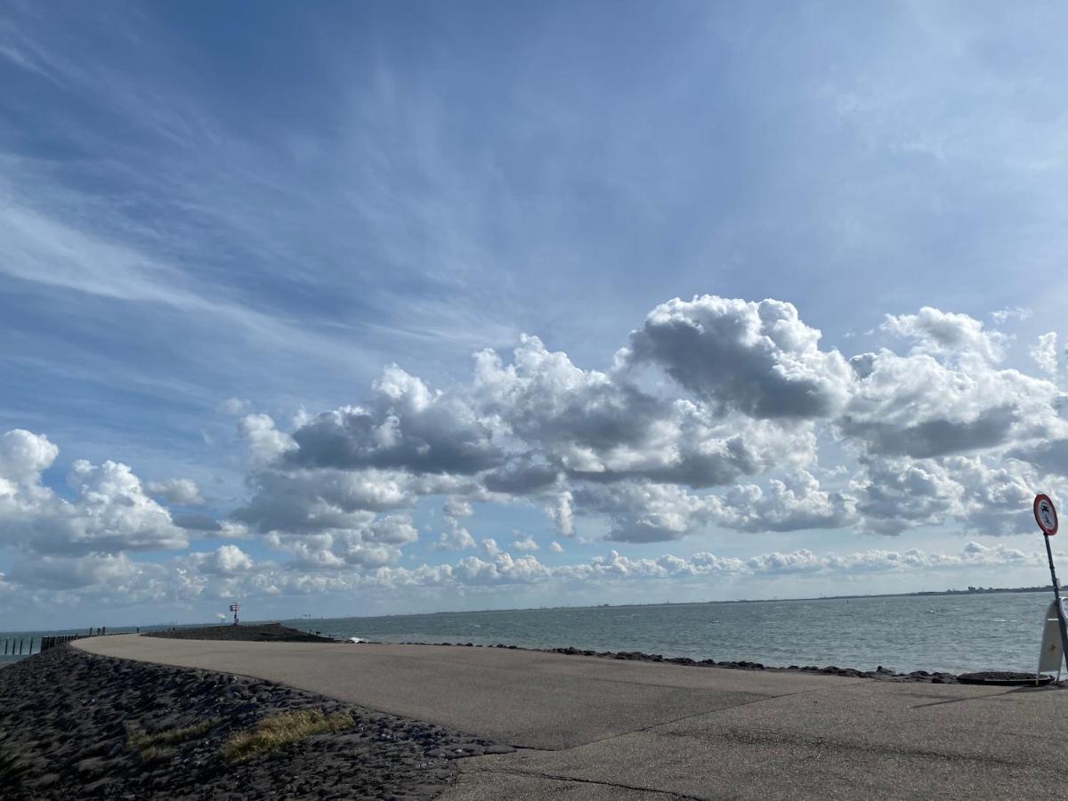 Bungalow Scheldezicht in Zeeland dicht bij zee Scherpenisse Buitenkant foto