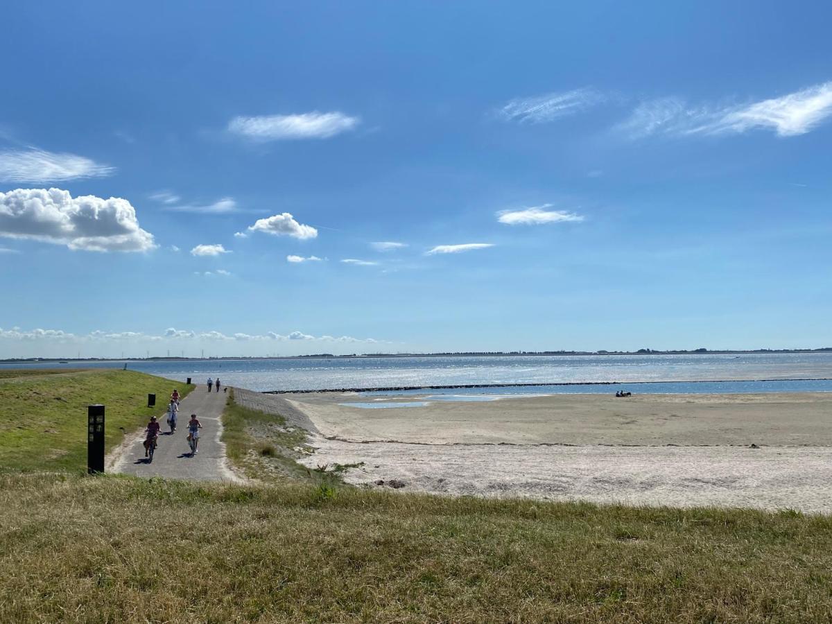 Bungalow Scheldezicht in Zeeland dicht bij zee Scherpenisse Buitenkant foto