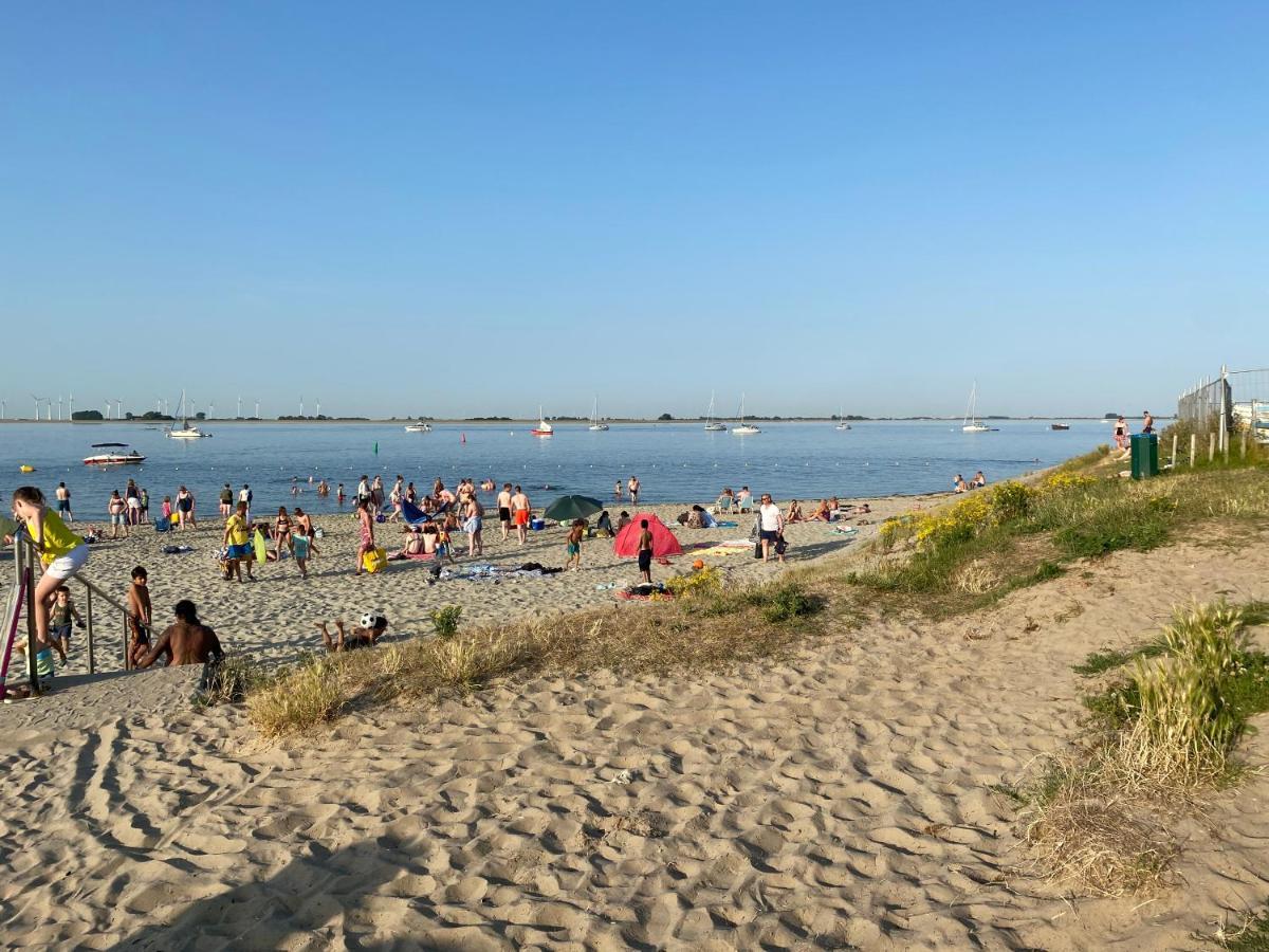Bungalow Scheldezicht in Zeeland dicht bij zee Scherpenisse Buitenkant foto