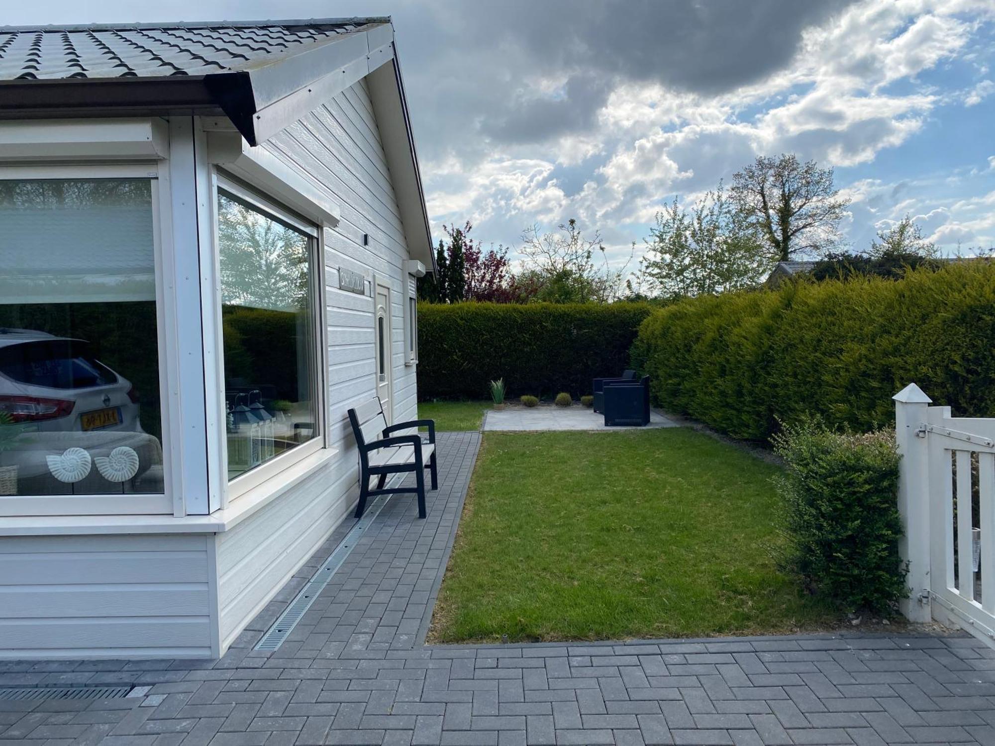 Bungalow Scheldezicht in Zeeland dicht bij zee Scherpenisse Buitenkant foto
